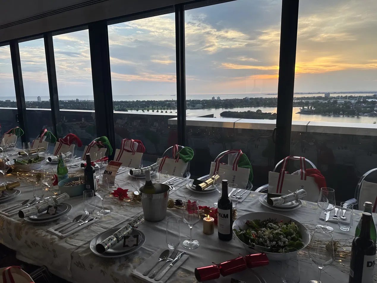 Long table dinner with bay views