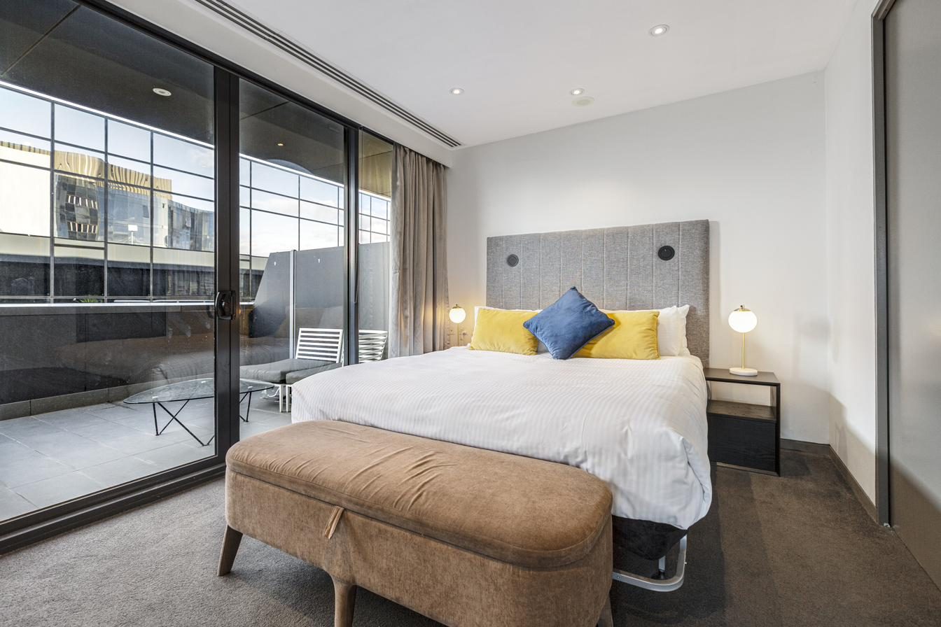 Penthouse bedroom with gold accents