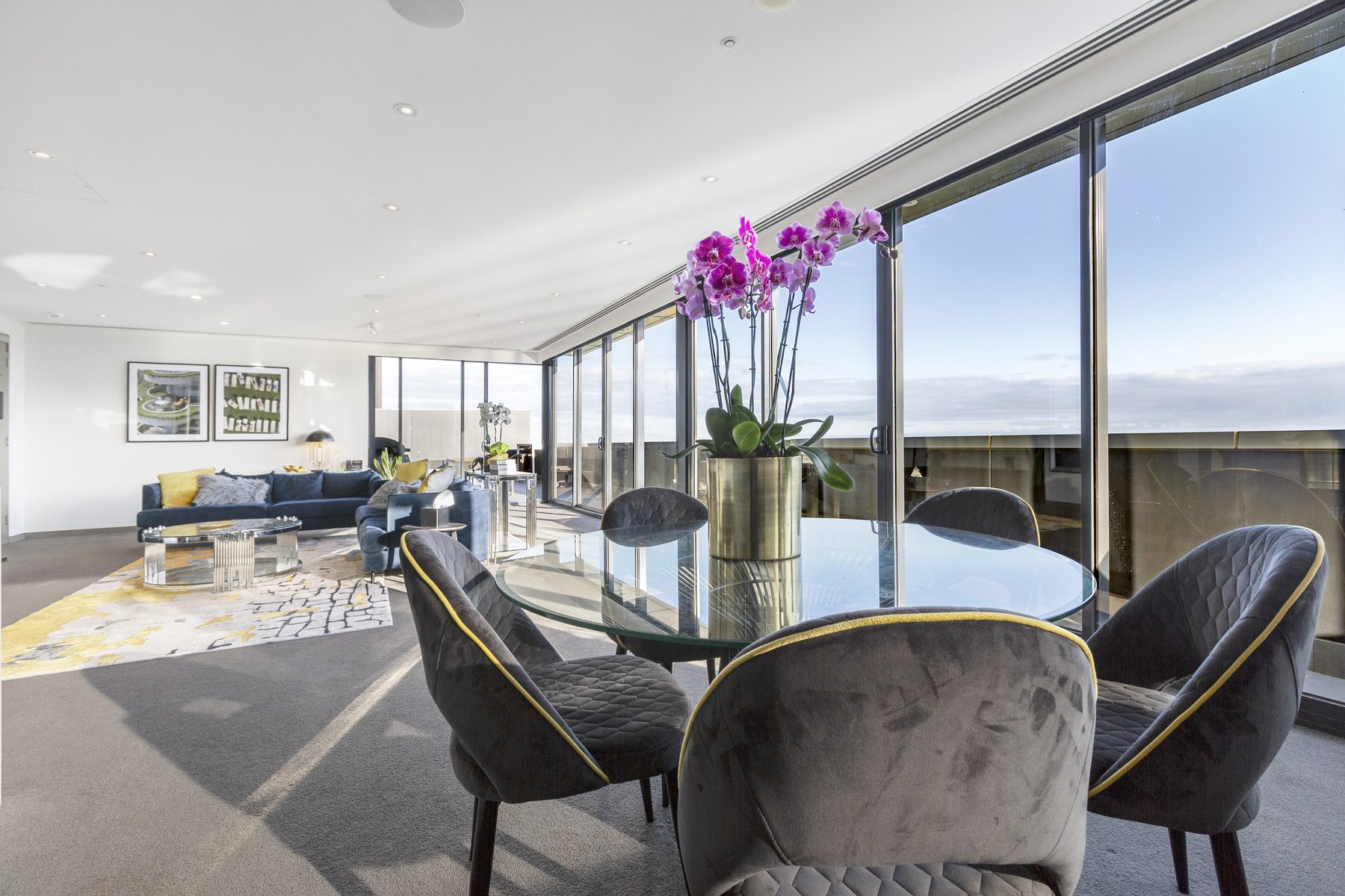Penthouse dining with floor-to-ceiling views